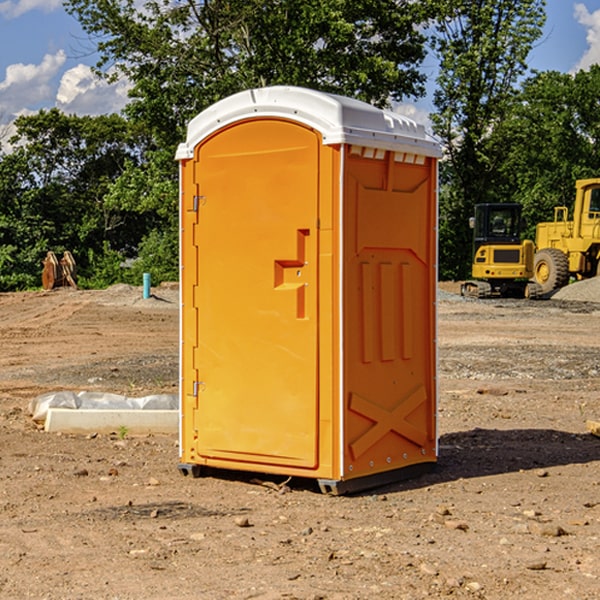 what is the cost difference between standard and deluxe portable restroom rentals in Falls City